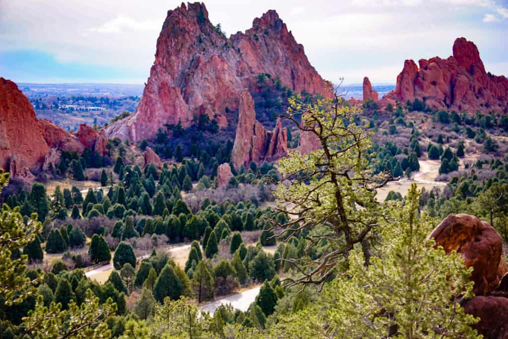 red peaks in the distance on the Garden of the Gods trail