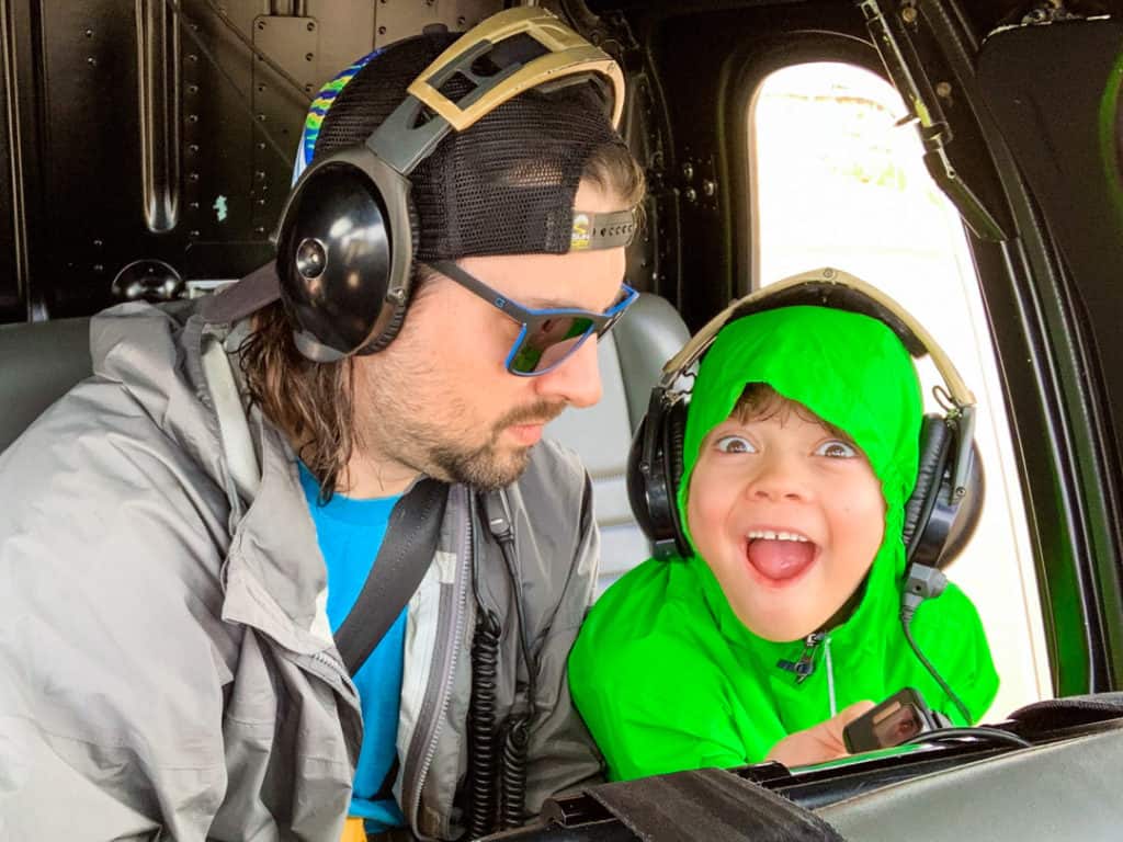 Father and very excited Boy in helicopter