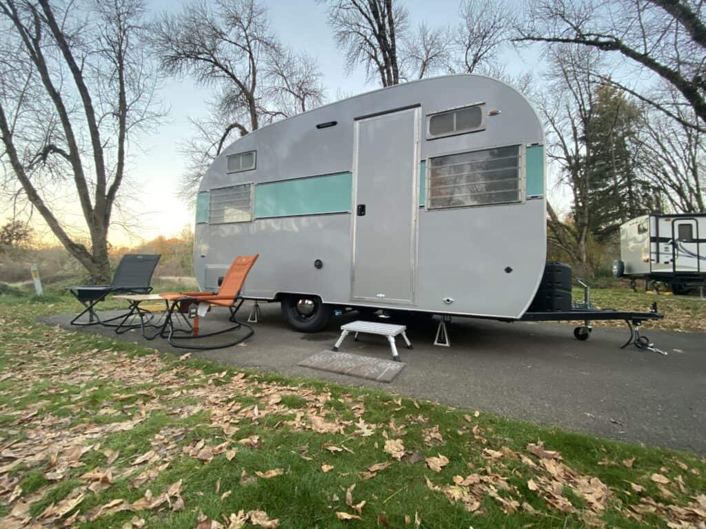 Aero Teardrops The Sellwood retro style trailer in grey and teal at campsite