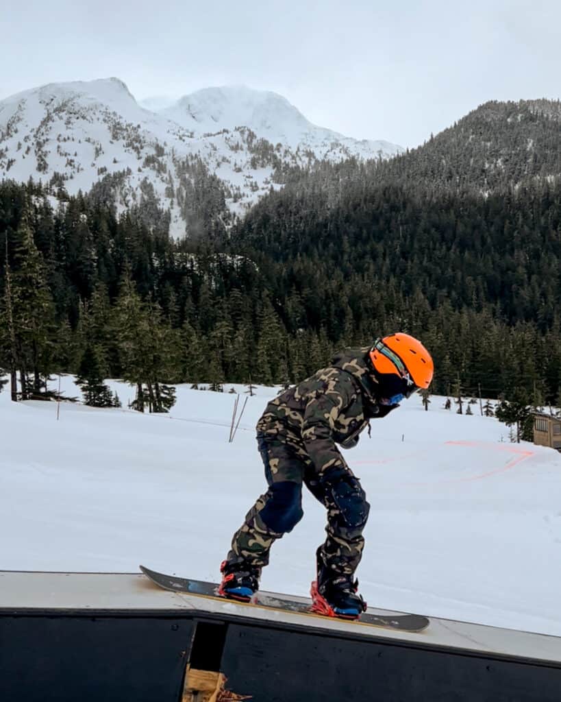 boy snowboarding in park at Eagle Crest in Juneau